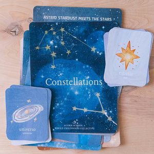 The cover page and bilingual vocabulary cards from Acorn School's Constellations Curriculum.