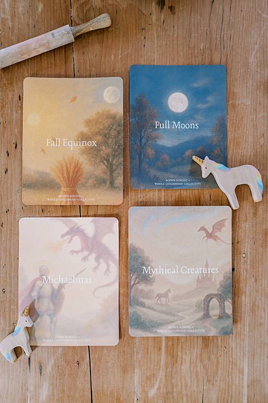 Image of four cards laying on a wooden table